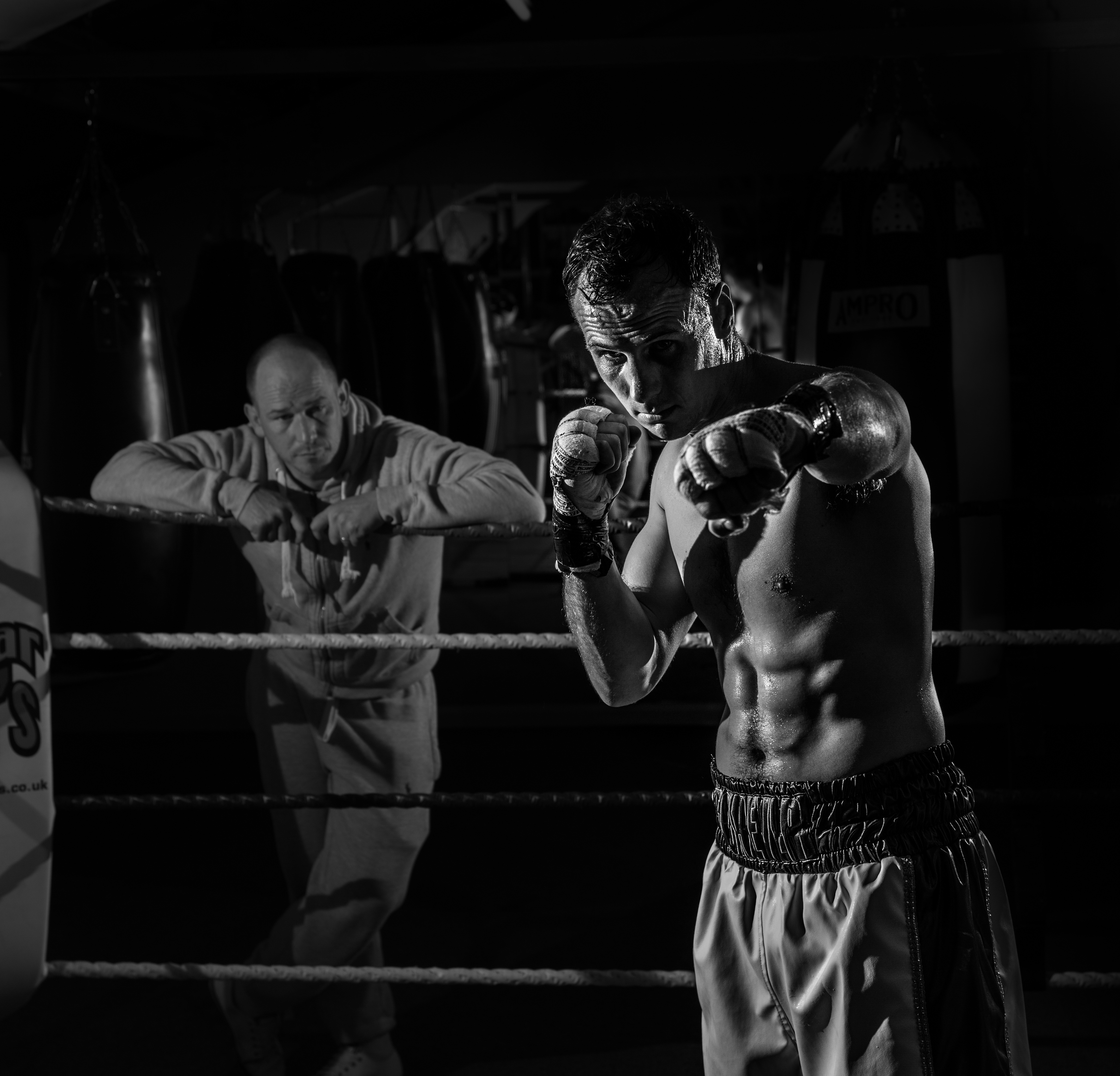 Combat sports coach training athletes